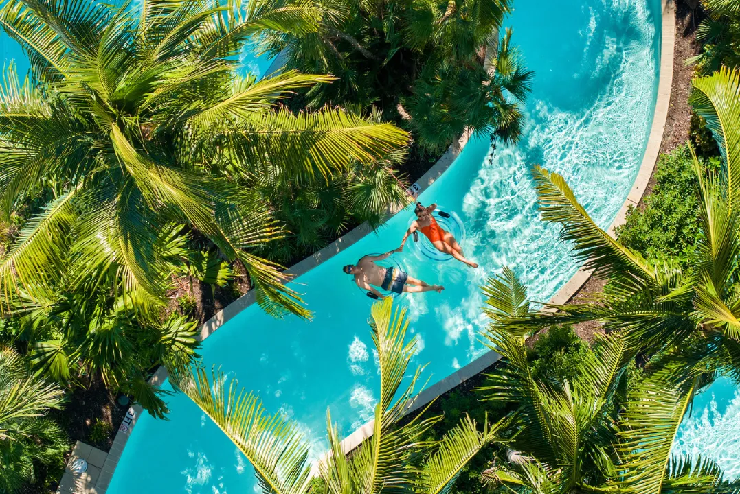 A couple enjoys a peaceful float down the lazy river at Hyatt Regency Coconut Point Resort & Spa