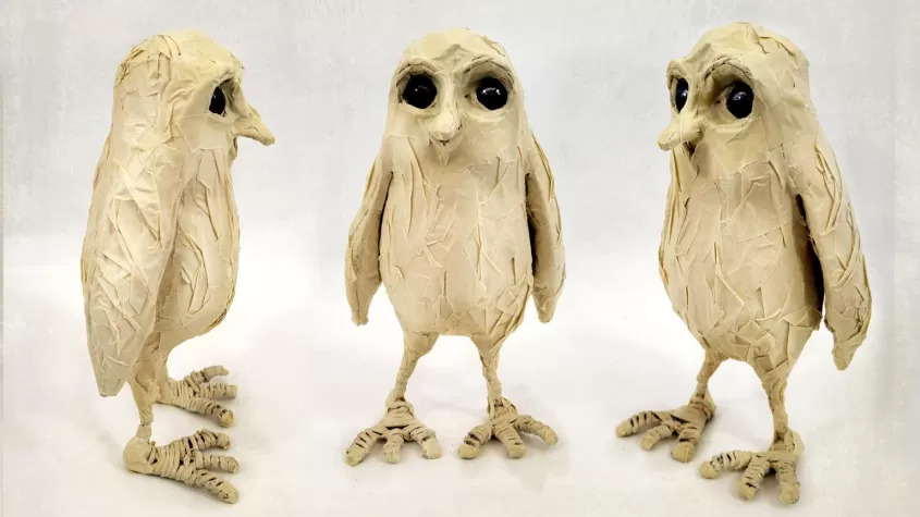 Small owls made out of masking tape