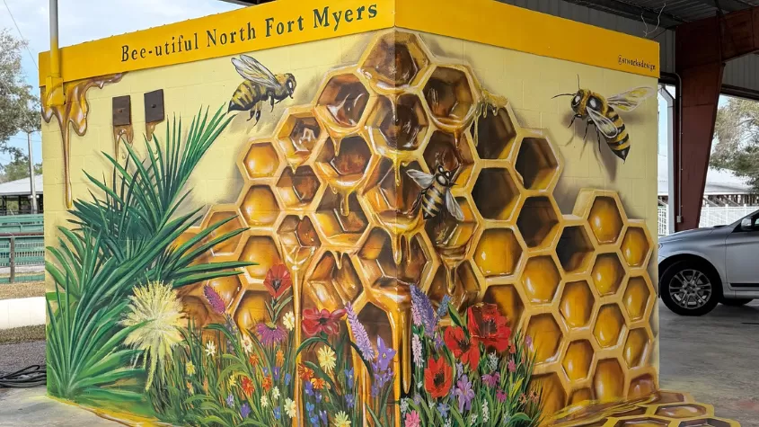 Bee-autiful mural in North Fort Myers depicting 3D honey bees
