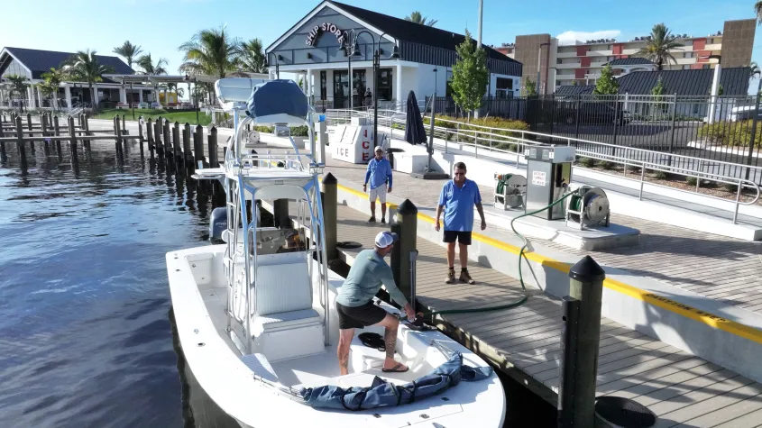 Boat fueling at marina fuel dock