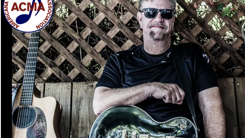 Performer RB Stone with guitar and ACMA logo in corner