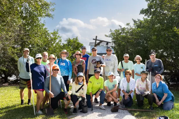 group of people smiling after a volunteer event
