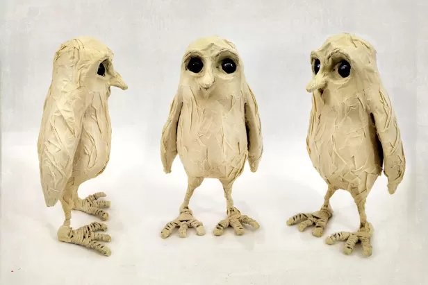 Small owls made out of masking tape
