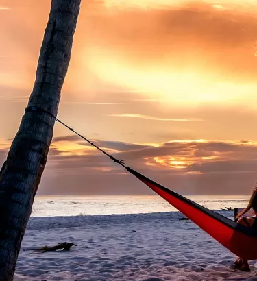 Enjoy a breathtaking sunset on the beach