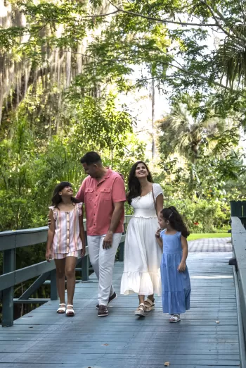 Family walking on boardwalk in Bonita Springs