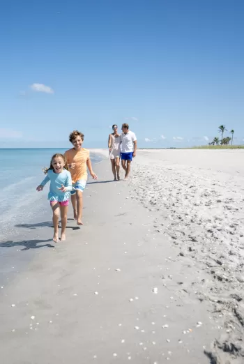 Family playing on beach