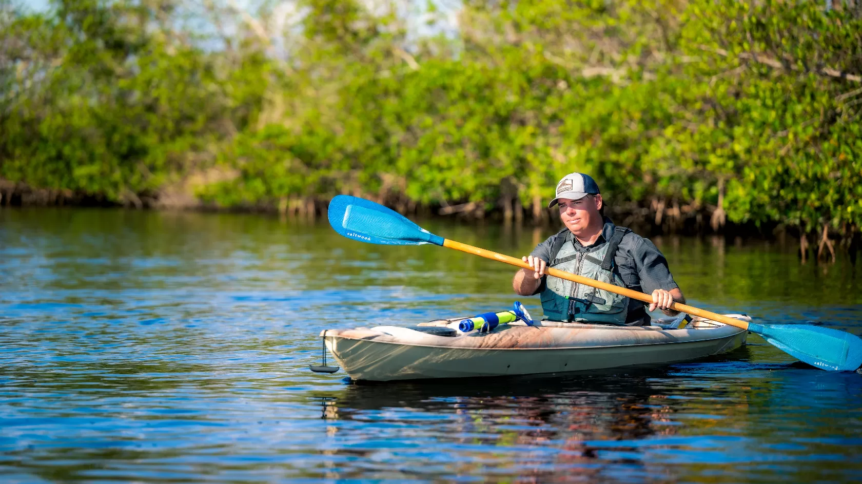 Bryan with Gulf Coast Kayak paddles through mangroves in Cape Coral