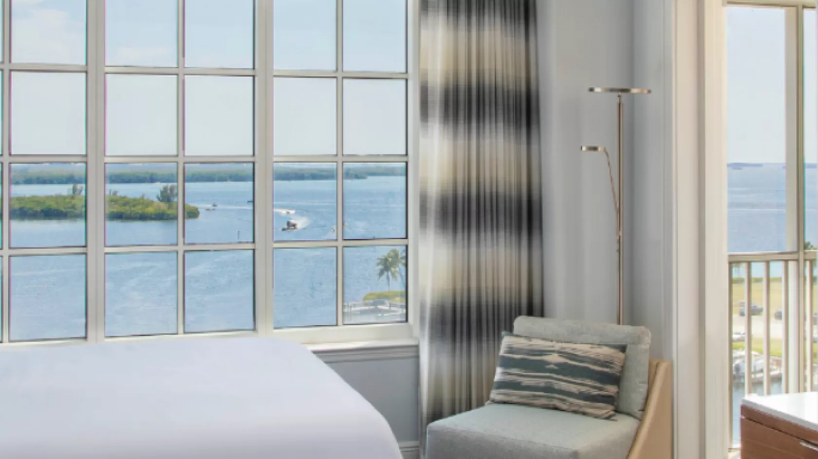 A hotel room with waterfront views