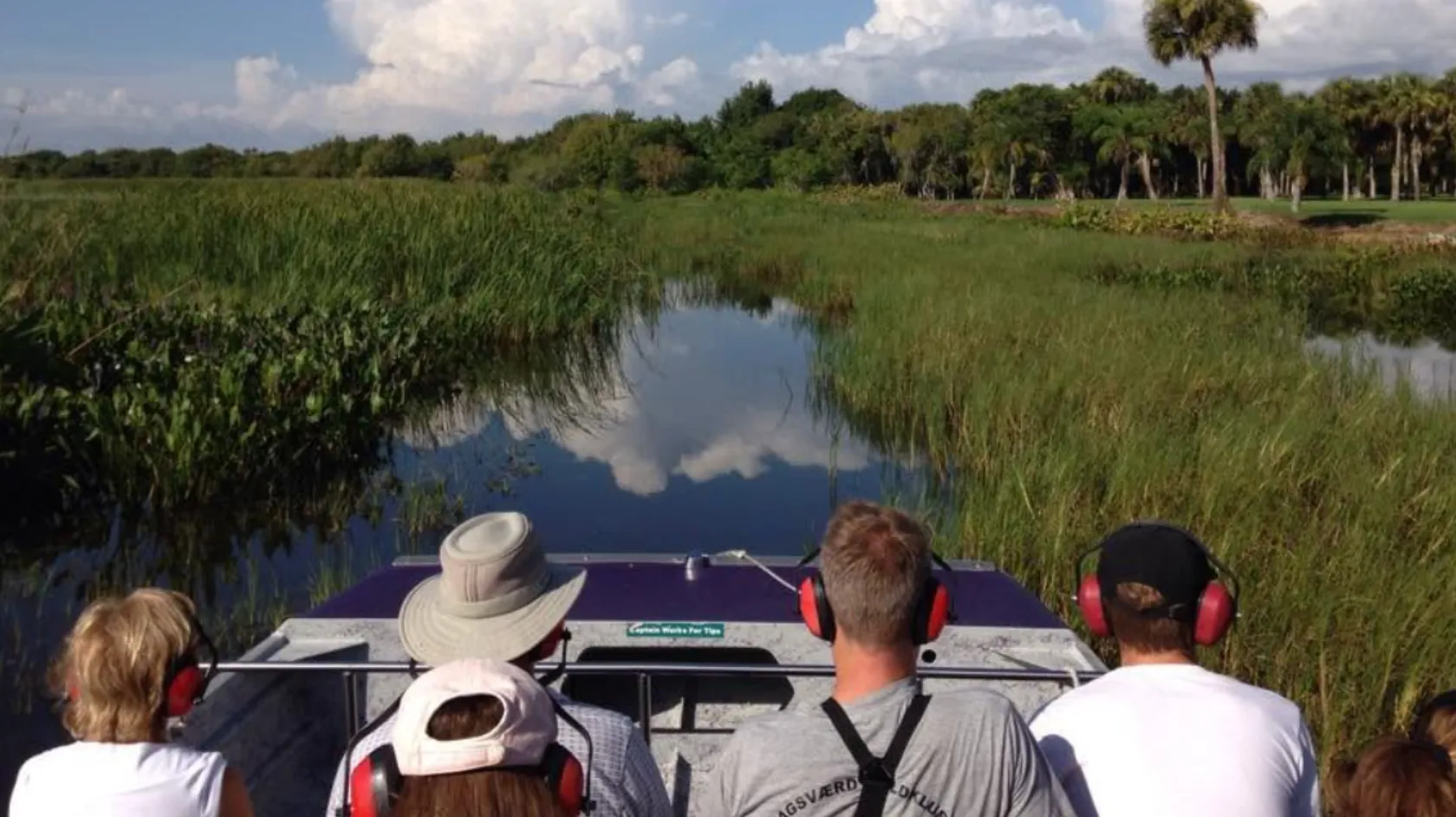 Visitors enjoy an airboat ride through the world-famous Everglades.