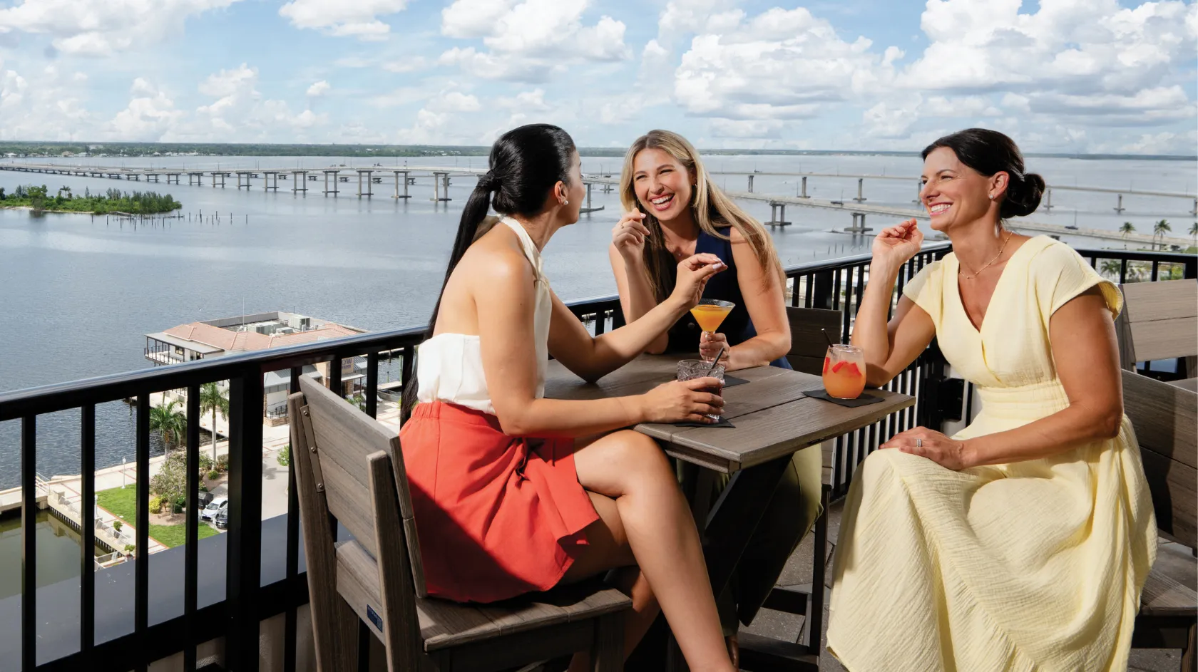 Women enjoying downtown rooftop bar