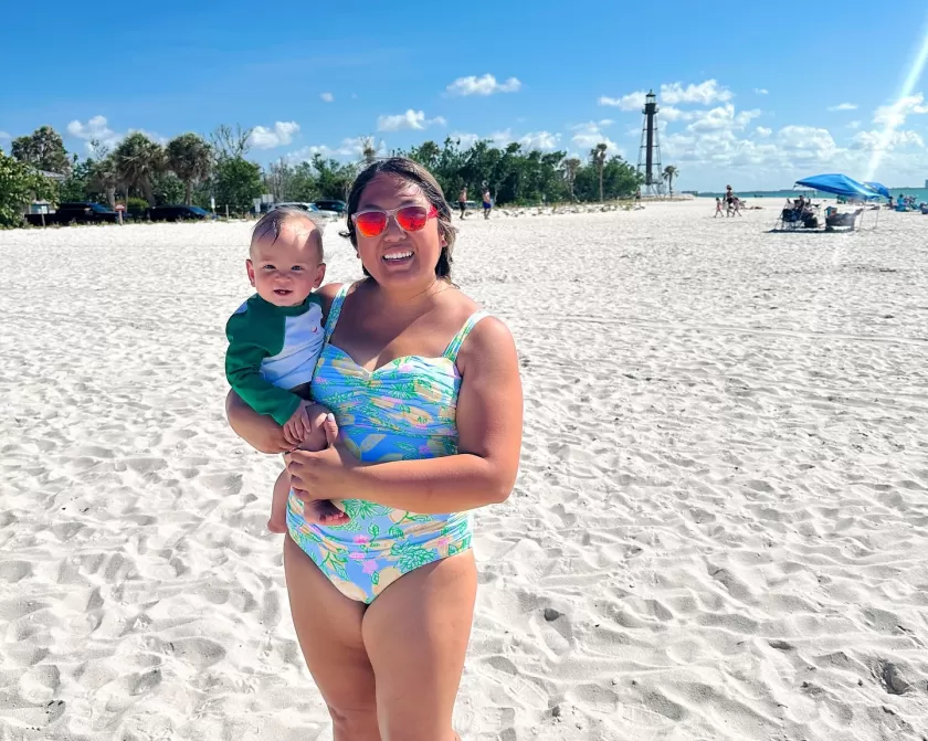 A lighthouse rises above the beach on Sanibel Island.