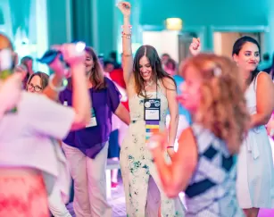 Woman dancing at conference