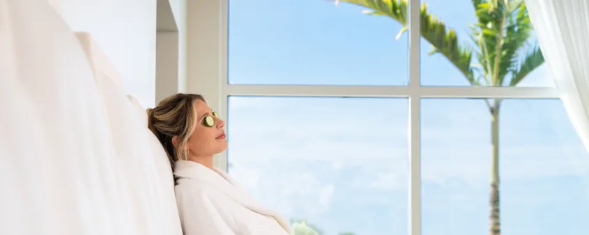 A woman relaxes at the spa