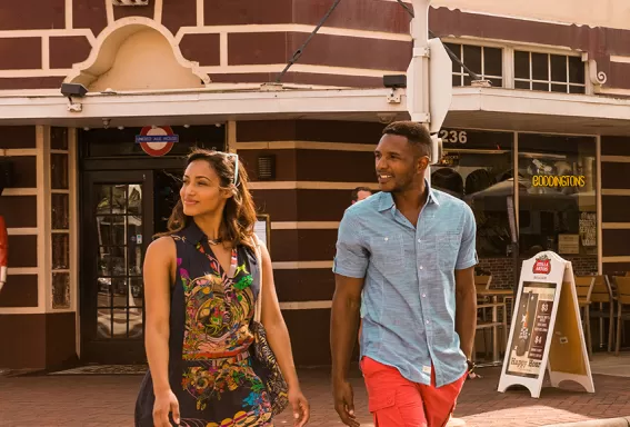 Couple in front of a restaurant