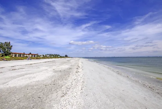Beach area in front of at Sanibel Arms West Condos