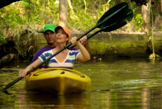A couple kayaks through the wilderness on the Estero River