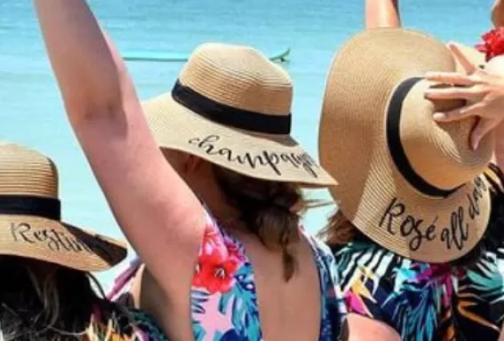 A group of women have fun on the beach