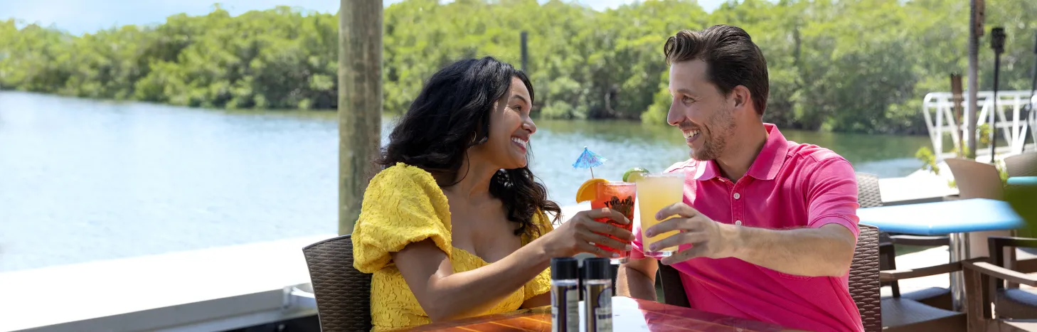 Couple Cheers on the water