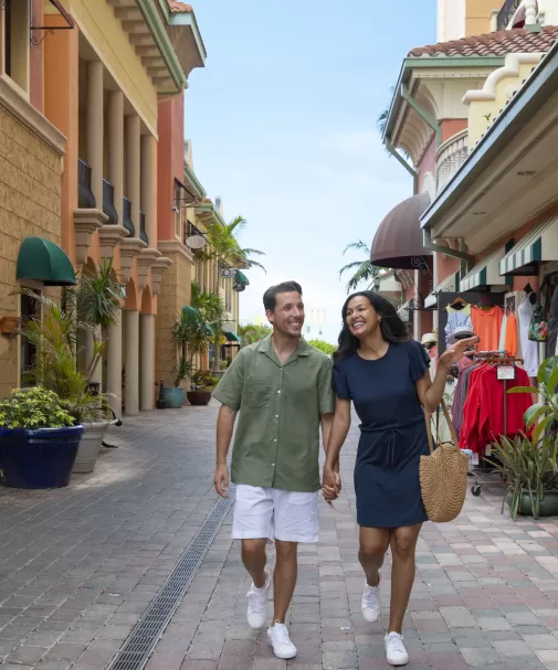 Man and woman outside shopping district