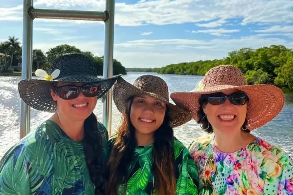 A family enjoys a boat ride