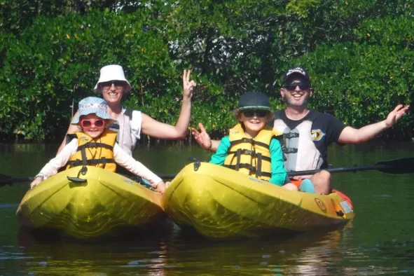A family enjoys a paddle along the Great Calusa Blueway