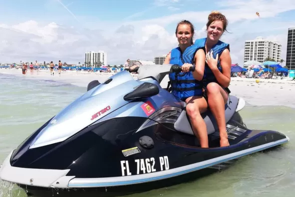 A mother and daughter enjoy jet skiing