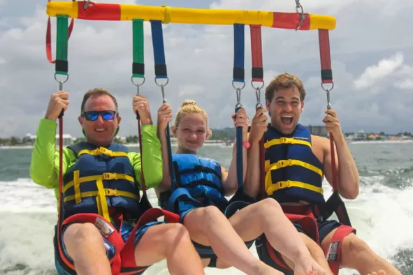 A family enjoys parasailing