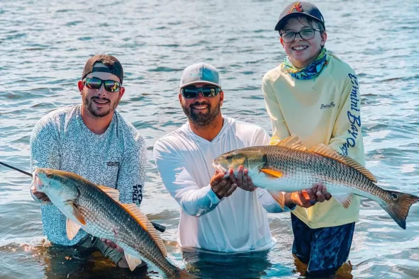 A family shows of their prize catches