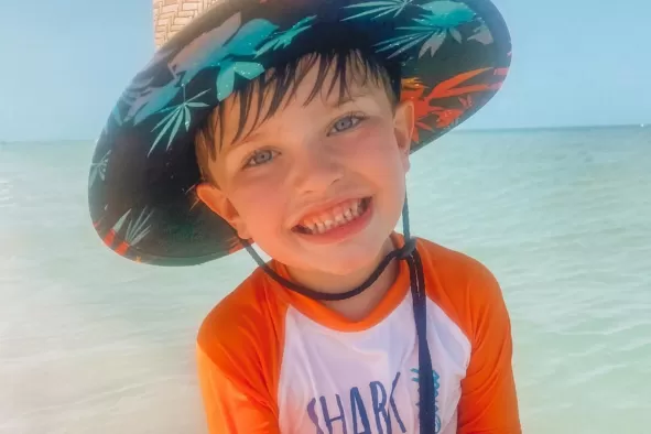 Boy enjoying learning about marine life