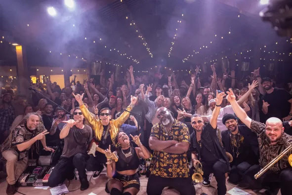Fans pose for the camera at a Sugarshack Downtown concert