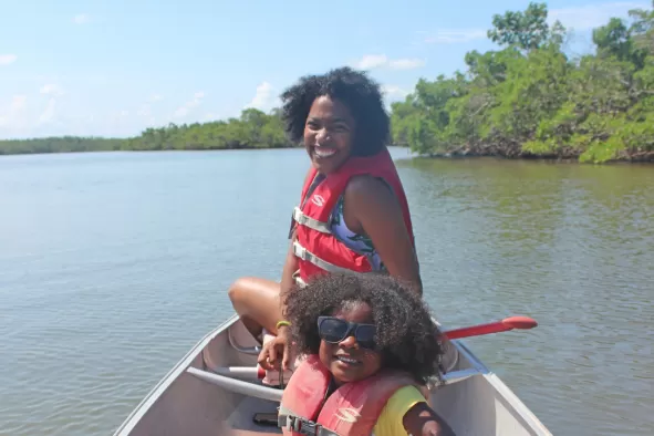 A mom and daughter enjoy a paddle