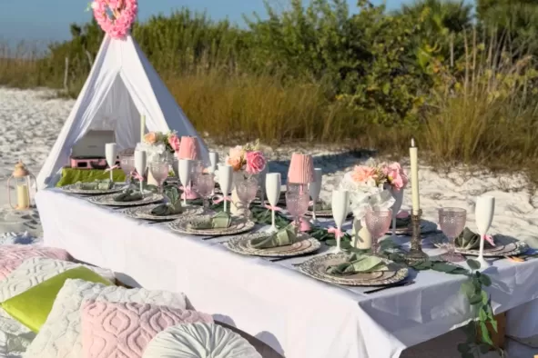 A festive birthday picnic set-up on the beach