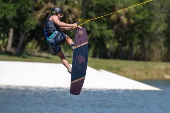 A teen water skis at Revolution Cable Park