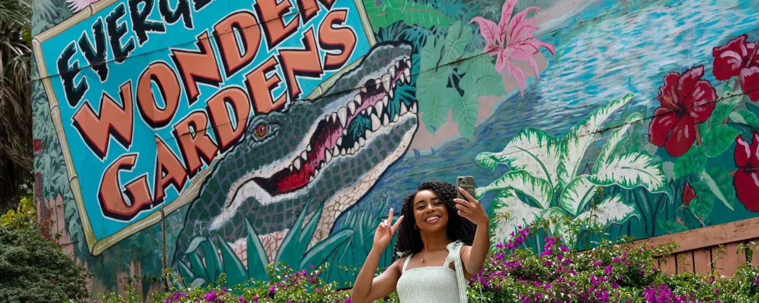 A woman takes a selfie at Wonder Gardens