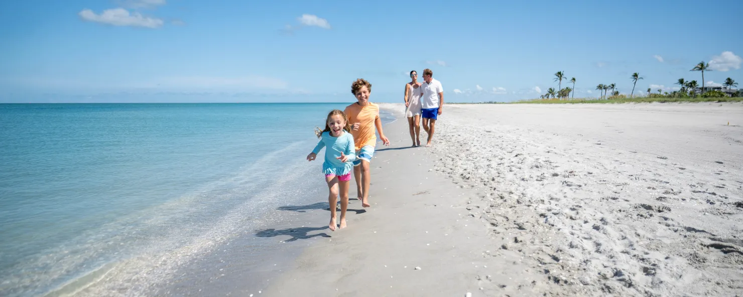 A family enjoys a day at the beach
