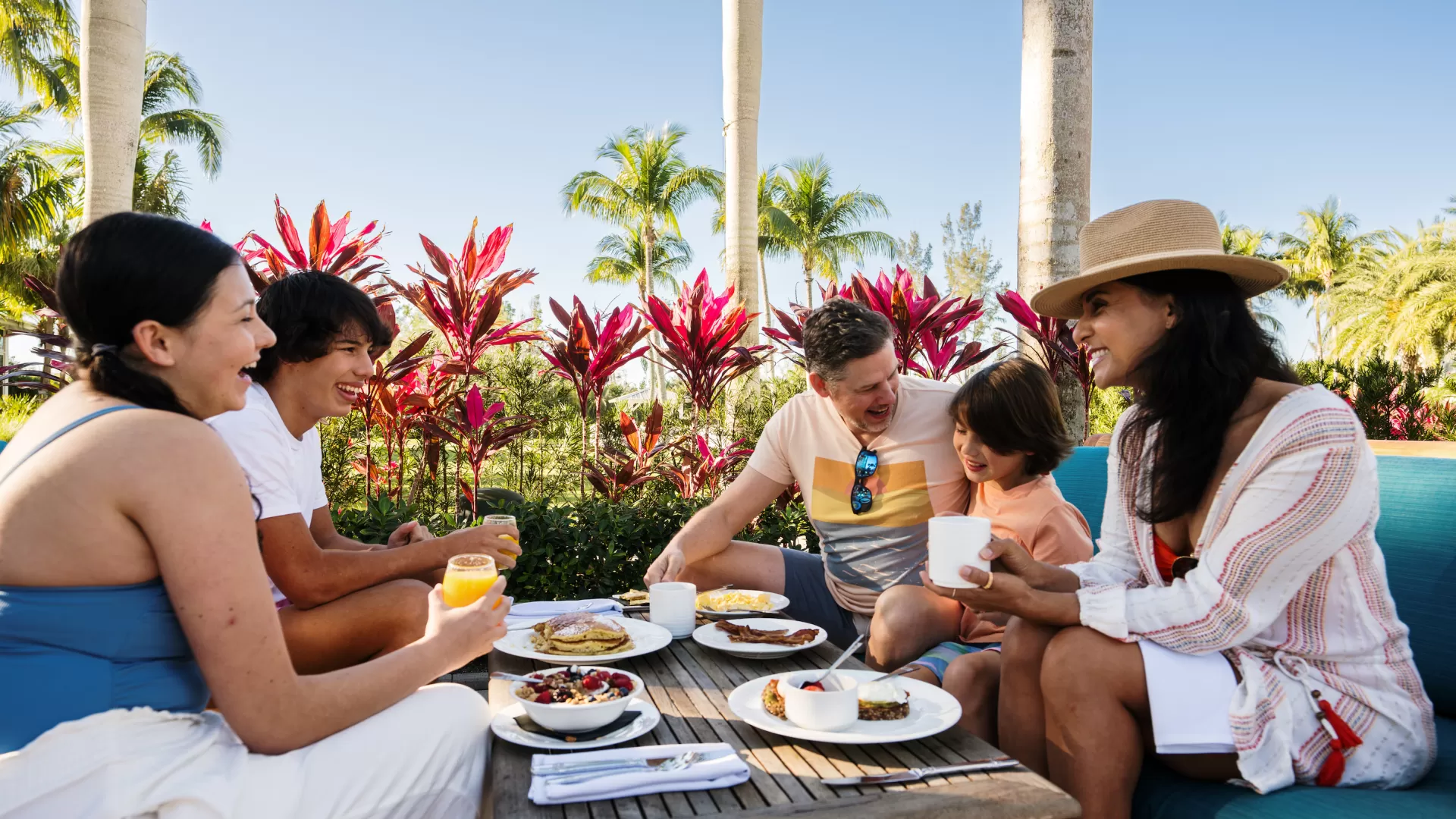 Family Eating Breakfast and Chatting