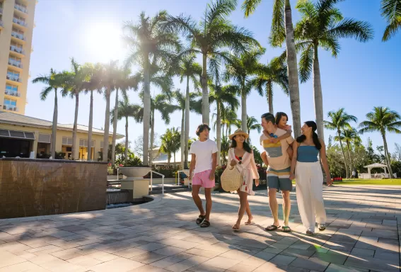 Family Walking Outside Hyatt Regency Coconut Point Resort & Spa